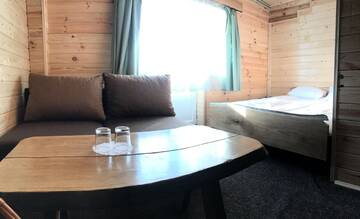 Фото номера Семейный номер с балконом Отель Alpin Eco Chalet &amp; Wellness г. Драгобрат 12